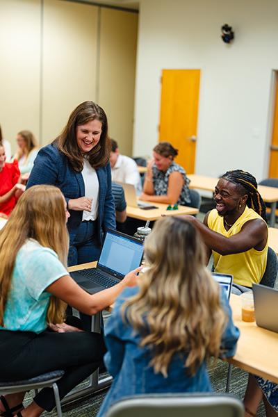 Students in discussion with a professor