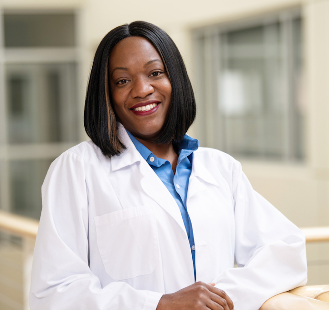 A nursing student looking at the camera for a photo.